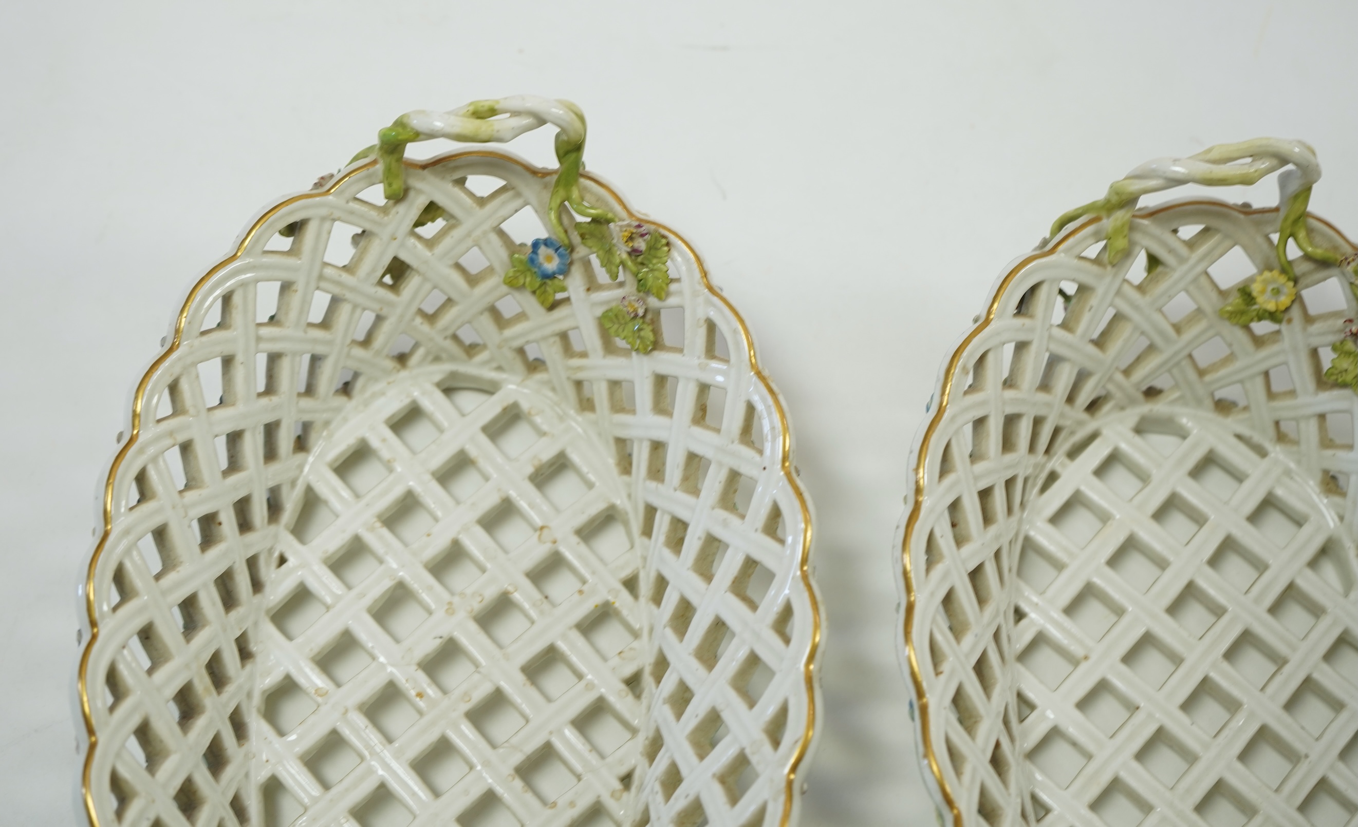 A pair of mid 18th century Meissen porcelain reticulated baskets c.1765